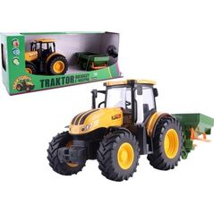 Traktor rolniczy z rozsiewaczem