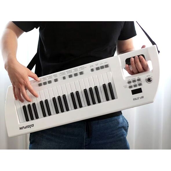 Jokomisiada Elektryczne pianino + mikrofon Zabawka Instrument dla dzieci IN0173