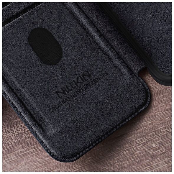 Etui Nillkin Qin Pro na Samsung Galaxy S25 z klapką i osłoną aparatu - czarne