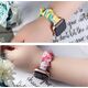 Hurtel Materiałowa opaska do Watch 7 / 6 / 5 / 4 / 3 / 2 / SE (45 / 44 / 42mm) pasek bransoleta bransoletka na gumce ananas 12666976 9145576255377