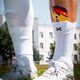 Ochraniacze piłkarskie Proskary Comic Shin Pads czarno-pomarańczowe 12x8 cm