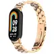 Pasek ze stali nierdzewnej Bizon Strap Watch Aura do Xiaomi Smart Band 9 / 9 NFC / 8 różowozłoty
